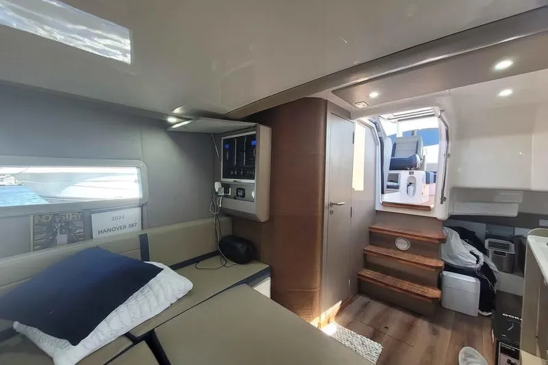Slide: The Image of Interior of 2024 Hanover 387 yacht with modern design and comfortable seating. - 9
