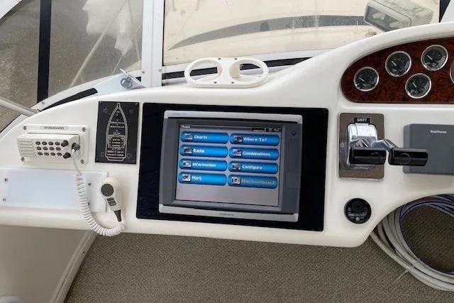 Slide: The Image of Control panel of a 1999 Sea Ray 420 Aft Cabin yacht with navigation display. - 7