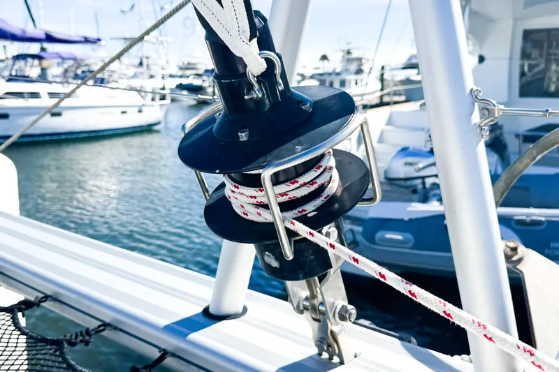 Slide: The Image of Close-up of a 2018 Lagoon 40 sailboat's rigging system at a marina. - 21