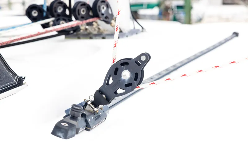 Slide: The Image of Close-up of a 2018 Lagoon 40 sailboat rigging component on deck. - 22