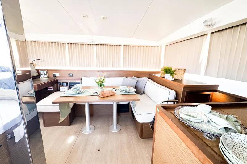 Slide: The Image of Luxurious interior of 2018 Lagoon 40 catamaran with elegant dining area and modern decor. - 26