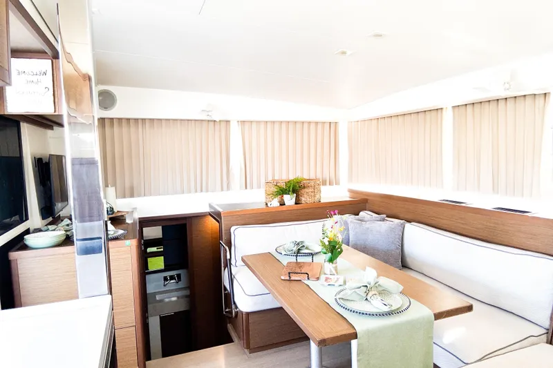 Slide: The Image of Interior of 2018 Lagoon 40 catamaran with elegant dining area and modern decor. - 27