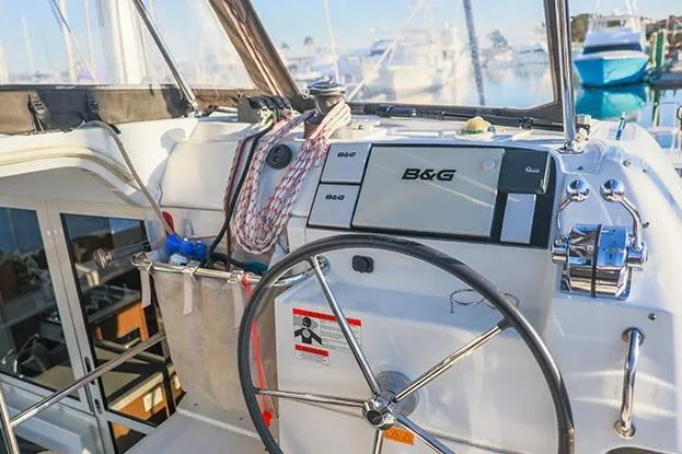 Slide: The Image of Cockpit of 2018 Lagoon 40 catamaran with B&G navigation system and steering wheel. - 57