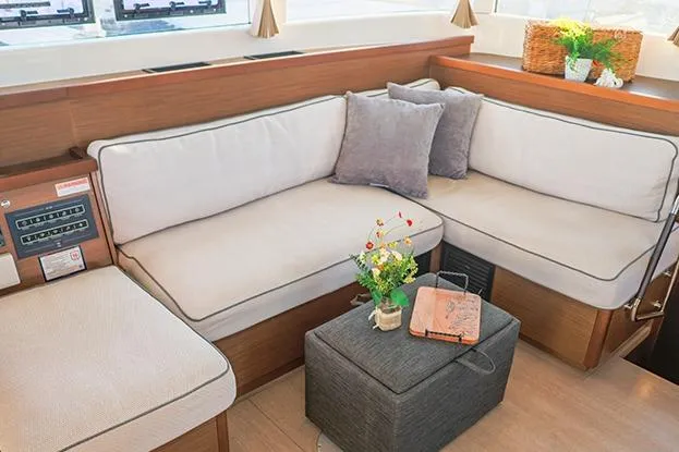 Slide: The Image of Luxurious interior of 2018 Lagoon 40 catamaran with cozy seating and elegant decor. - 61