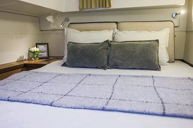 Slide: The Image of Luxurious bedroom interior of 2018 Lagoon 40 yacht with cozy bedding and elegant decor. - 74