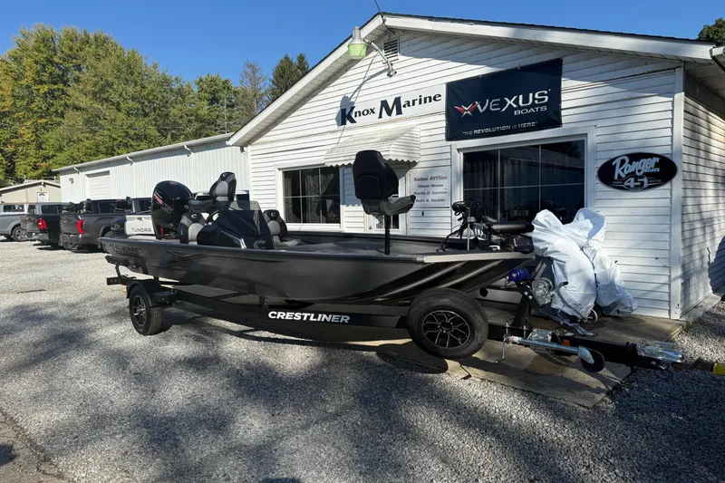 Slide: The Image of 2026 Crestliner XF189 boat at Knox Marine dealership, parked outdoors. - 10