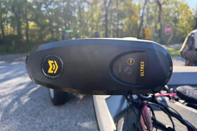 Slide: The Image of Close-up of Ultrex motor on 2026 Crestliner XF189 boat, outdoors. - 13