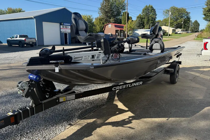 Slide: The Image of 2026 Crestliner XF189 fishing boat on trailer, equipped with Minn Kota Ultrex motor. - 16