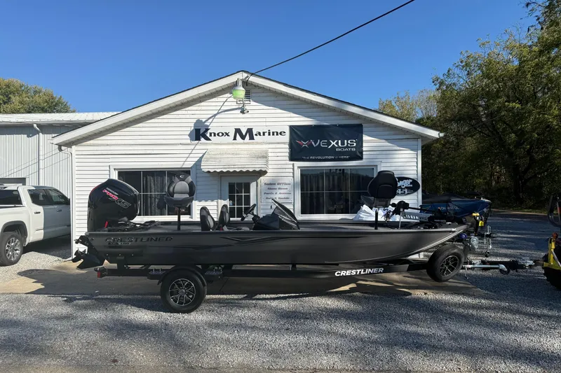 Slide: The Image of 2026 Crestliner XF189 boat parked outside Knox Marine dealership. - 9