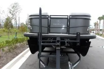 Slide: The Image of 2021 Regency 250 LE3 Sport pontoon boat on trailer, rear view. - 3