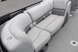 Slide: The Image of 2021 Regency 250 LE3 Sport boat interior with plush gray seating. - 6