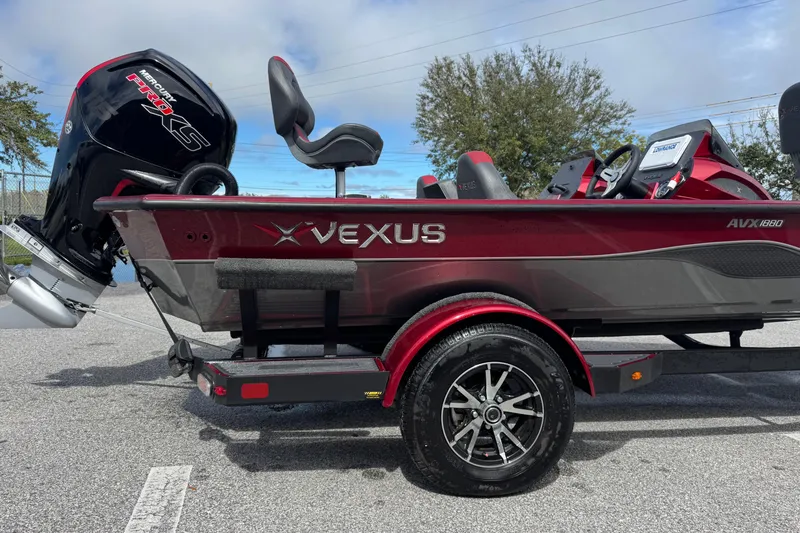 Slide: The Image of 2022 Vexus AVX1880 boat with Mercury Pro XS engine on a trailer. - 10