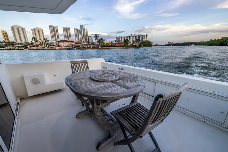 Slide: The Image of Deck view from 2003 Navigator Rival 5700 yacht, overlooking waterfront cityscape and skyline. - 17