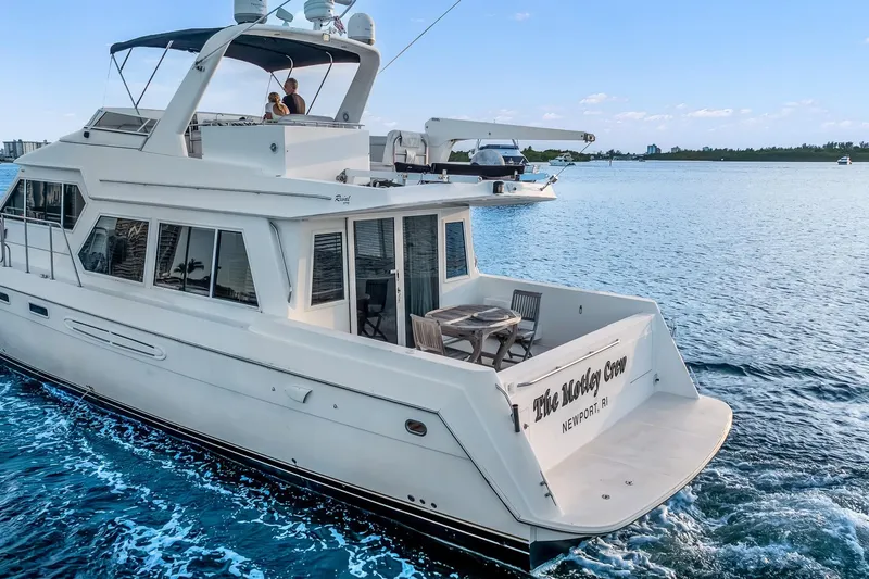 Slide: The Image of Luxury yacht Navigator Rival 5700 cruising on blue waters, 2003 model. - 4