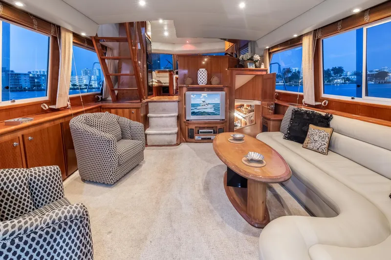 Slide: The Image of Luxurious interior of 2003 Navigator Rival 5700 yacht with elegant seating and decor. - 41