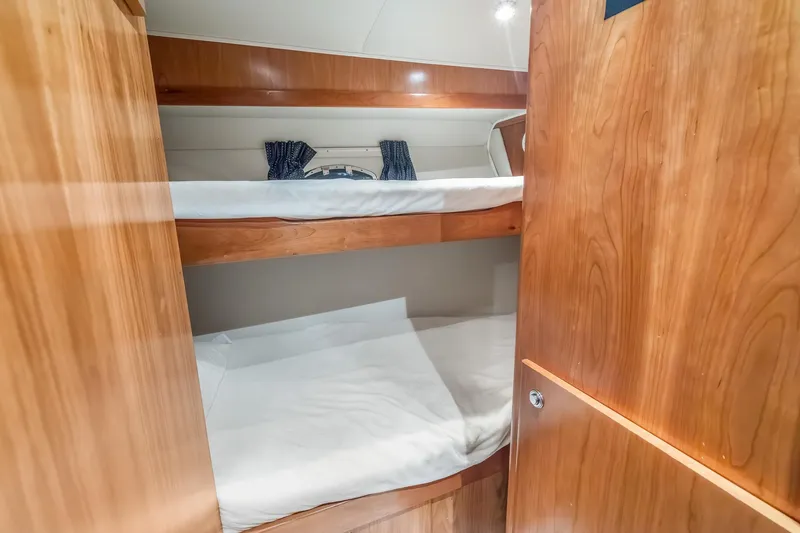 Slide: The Image of Bunk beds in 2003 Navigator Rival 5700 yacht cabin with wooden interior. - 50