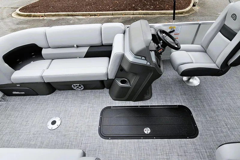 Slide: The Image of 2026 Sun Tracker Party Barge 22 RF XP3 interior with luxurious seating and cup holders. - 15