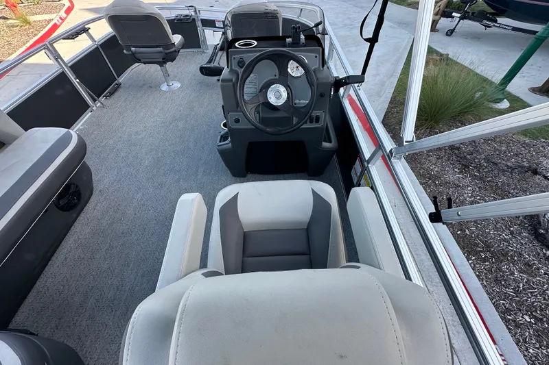 Slide: The Image of Interior view of 2026 Sun Tracker Bass Buggy 16 XL Select pontoon boat. - 26