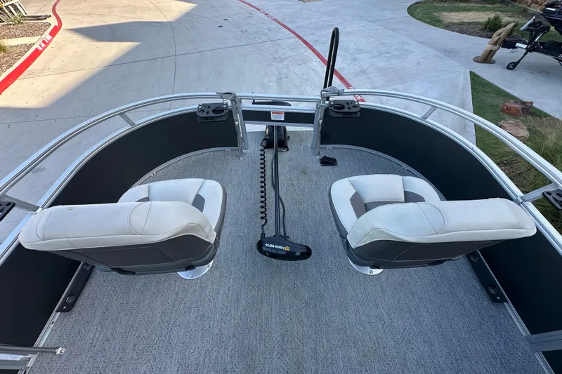 Slide: The Image of 2026 Sun Tracker Bass Buggy 16 XL Select pontoon boat with dual seating. - 18