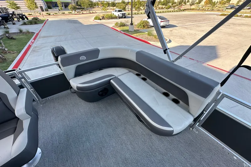 Slide: The Image of 2026 Sun Tracker Bass Buggy 16 XL Select pontoon boat interior with gray seating. - 22