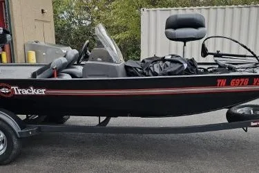 Slide: The Image of 2024 Tracker Bass Tracker Classic XL boat on trailer, side view. - 2