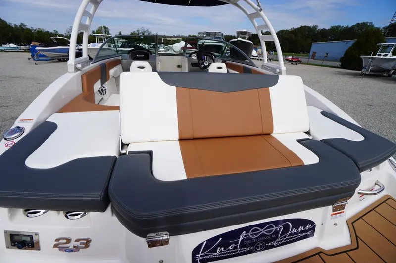 Slide: The Image of 2023 Chaparral 23 SSi OB boat with stylish seating and modern design. - 43