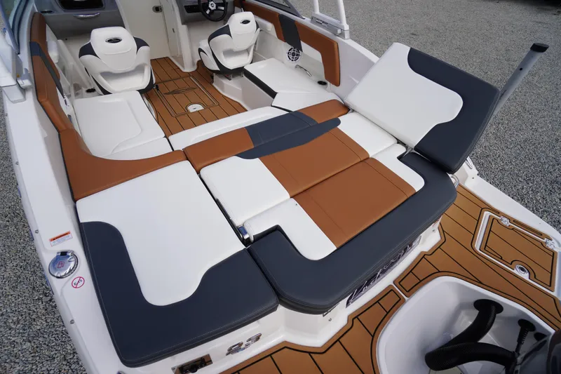 Slide: The Image of 2023 Chaparral 23 SSi OB boat interior with stylish seating and modern design. - 45