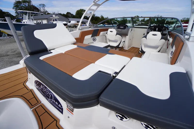 Slide: The Image of 2023 Chaparral 23 SSi OB boat interior with stylish seating and modern design. - 46