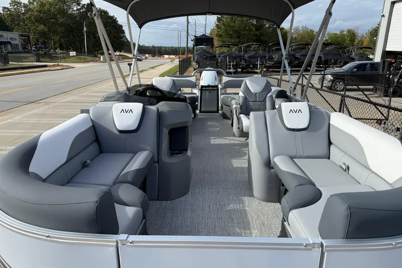 Slide: The Image of 2026 Avalon LSZ Quad Lounger Shift pontoon boat with luxurious seating and canopy. - 12