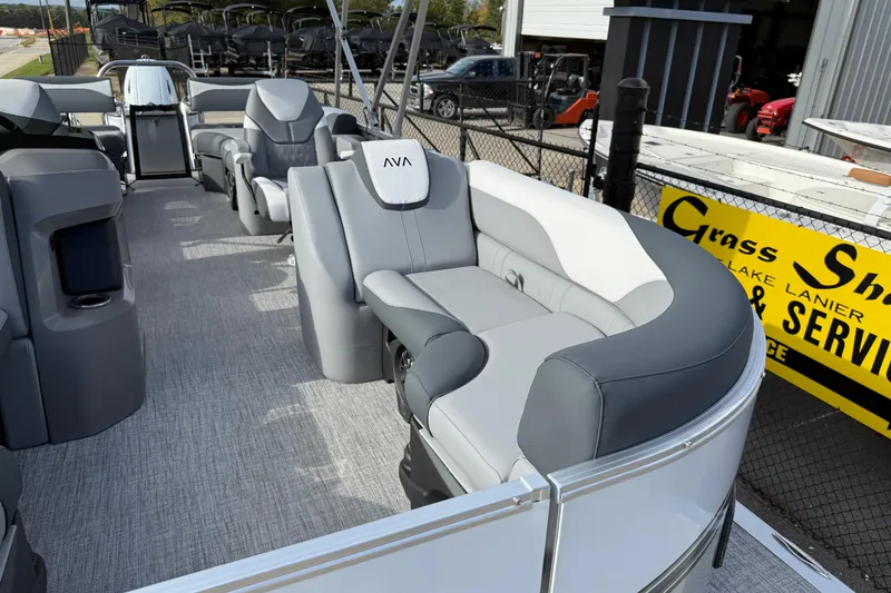 Slide: The Image of 2026 Avalon LSZ Quad Lounger Shift boat interior with luxurious seating and modern design. - 13