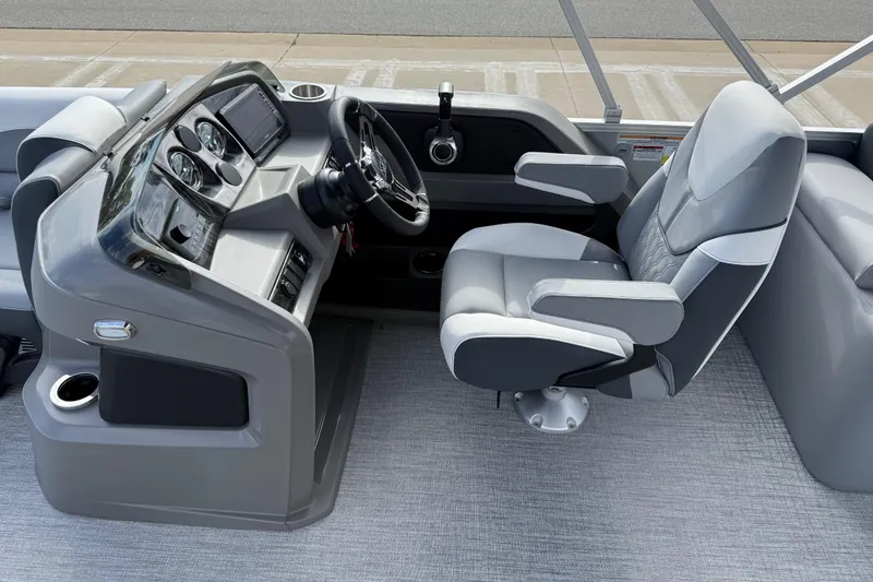 Slide: The Image of 2026 Avalon LSZ Quad Lounger Shift boat interior with modern helm and comfortable captain's chair. - 18