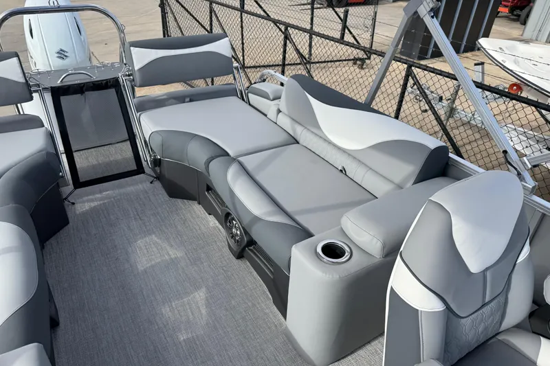 Slide: The Image of 2026 Avalon LSZ Quad Lounger Shift interior with gray seating and cup holder. - 30