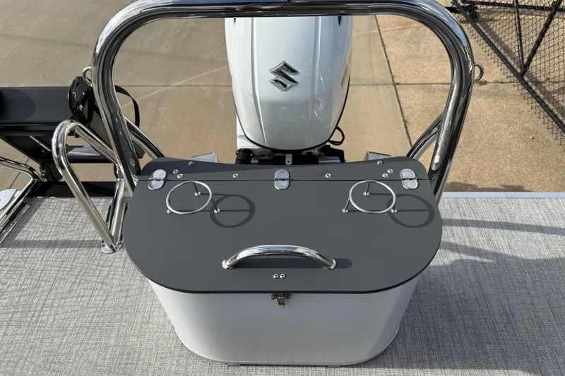 Slide: The Image of 2026 Avalon LSZ Quad Lounger Shift boat with Suzuki engine, featuring sleek design and cup holders. - 42
