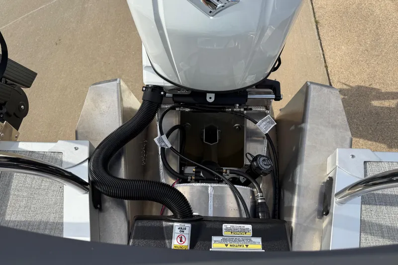 Slide: The Image of 2026 Avalon LSZ Quad Lounger Shift boat engine compartment with visible wiring and components. - 43