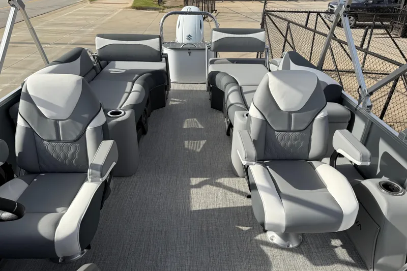 Slide: The Image of Luxurious 2026 Avalon LSZ Quad Lounger Shift pontoon boat with plush seating and modern design. - 51