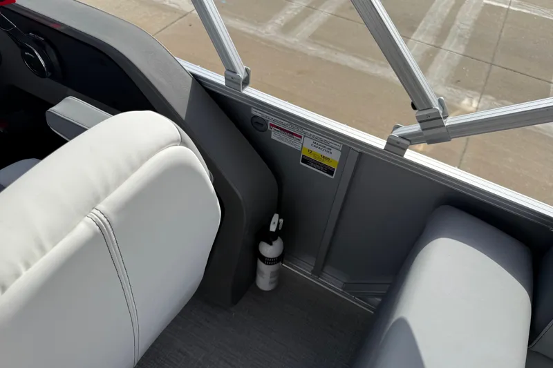 Slide: The Image of Interior of 2026 Avalon LSZ Quad Lounger Shift boat with seating and safety equipment. - 54