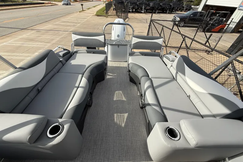 Slide: The Image of 2026 Avalon LSZ Quad Lounger Shift pontoon boat with spacious seating and modern design. - 56