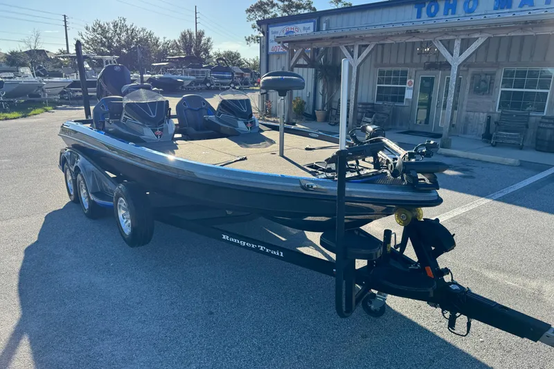 Slide: The Image of 2022 Ranger Z520R Cup-Equipped boat on trailer outside marina. - 11