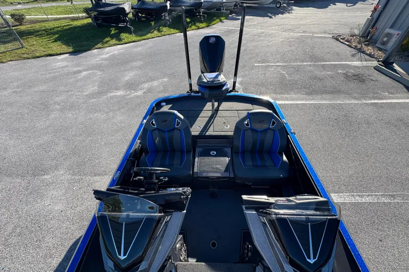 Slide: The Image of 2022 Ranger Z520R Cup-Equipped boat with dual seats and sleek design in a parking lot. - 15