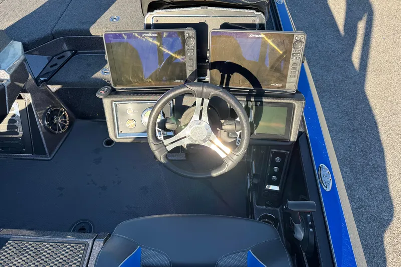Slide: The Image of 2022 Ranger Z520R Cup-Equipped boat dashboard with dual Lowrance displays and steering wheel. - 18
