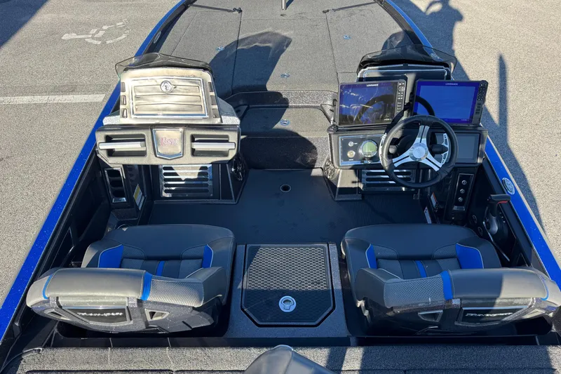 Slide: The Image of 2022 Ranger Z520R Cup-Equipped boat interior with dual seats and advanced navigation displays. - 19