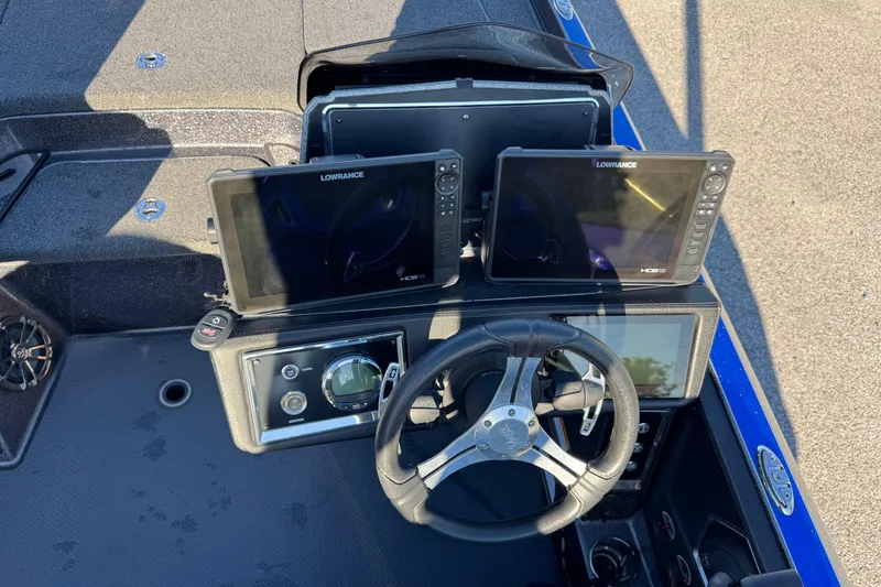 Slide: The Image of 2022 Ranger Z520R Cup-Equipped boat dashboard with Lowrance HDS displays and steering wheel. - 21