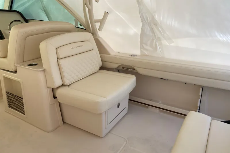Slide: The Image of 2026 Grady-White Freedom 325 boat interior with luxurious seating and modern design. - 10