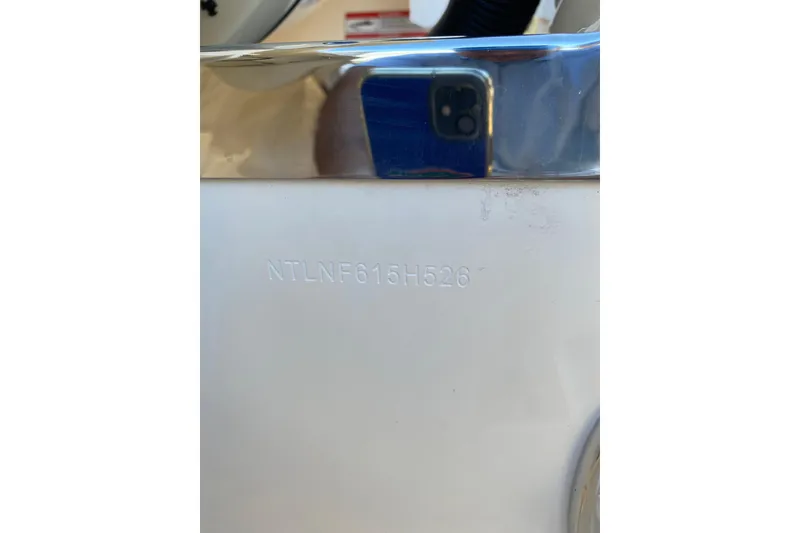 Slide: The Image of 2026 Grady-White Freedom 325 boat hull identification number close-up. - 17