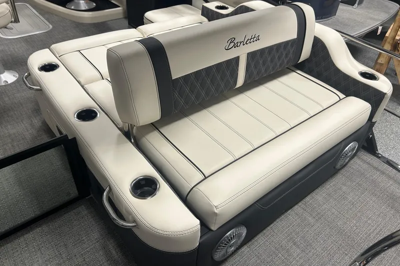 Slide: The Image of 2025 Barletta Lusso 25UE boat seating with cup holders and elegant upholstery. - 10