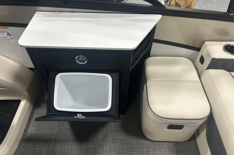 Slide: The Image of Barletta Lusso 25UE 2025 interior with storage compartment and seating. - 11