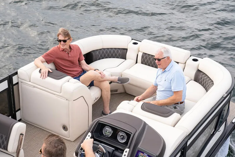 Slide: The Image of 2025 Barletta Lusso 25UE luxury pontoon boat interior with seating and helm. - 20