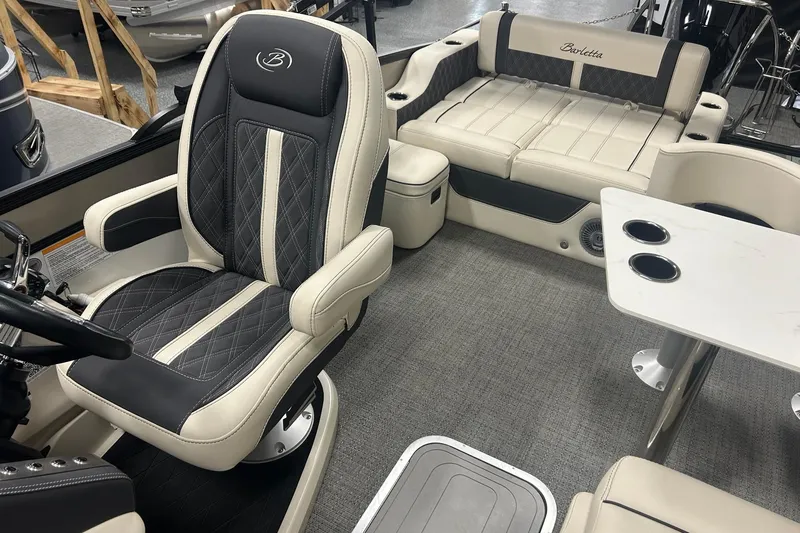 Slide: The Image of Luxurious interior of 2025 Barletta Lusso 25UE pontoon boat with plush seating and modern design. - 7