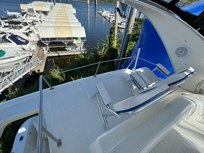 Slide: The Image of 2004 Meridian 381 Sedan yacht with sun deck, docked at marina. - 15