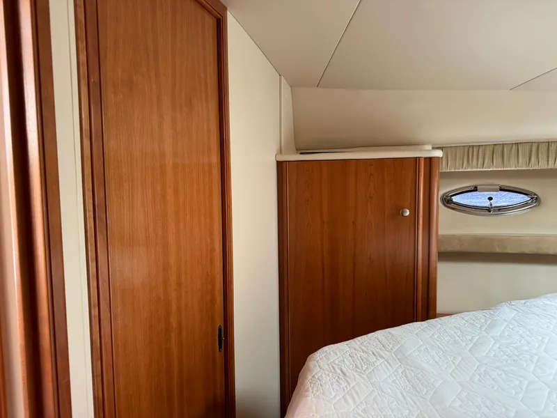 Slide: The Image of Interior of 2004 Meridian 381 Sedan with wooden cabinetry and a small window. - 35